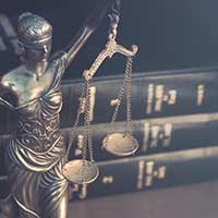 lady justice statue, law books, florida probate attorneys