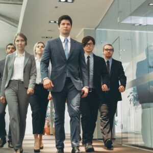 team of lawyers marching through corporate building, international law attorneys