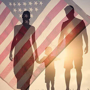 silhouette of family with american flag